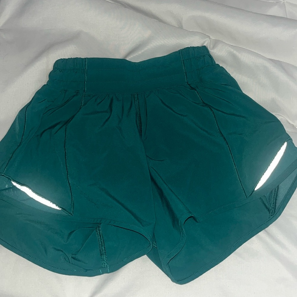Lululemon size 0 green shorts. They are 4 inch and have only been worn once.